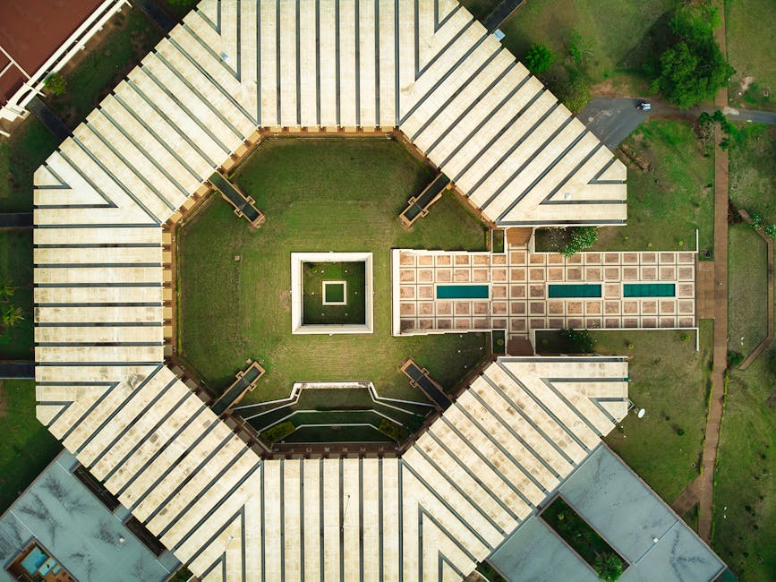 Stunning aerial drone shot of a hexagonal building in Yamoussoukro, Côte d'Ivoire.