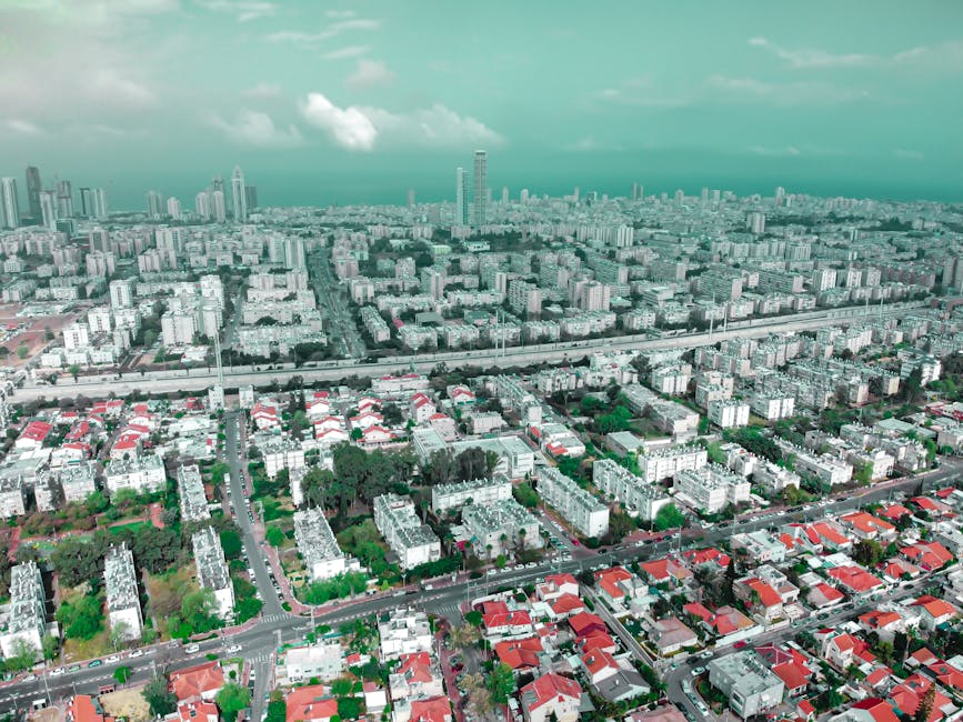 Drone view of Holon cityscape in Israel showcasing buildings and streets in a vibrant urban setting.
